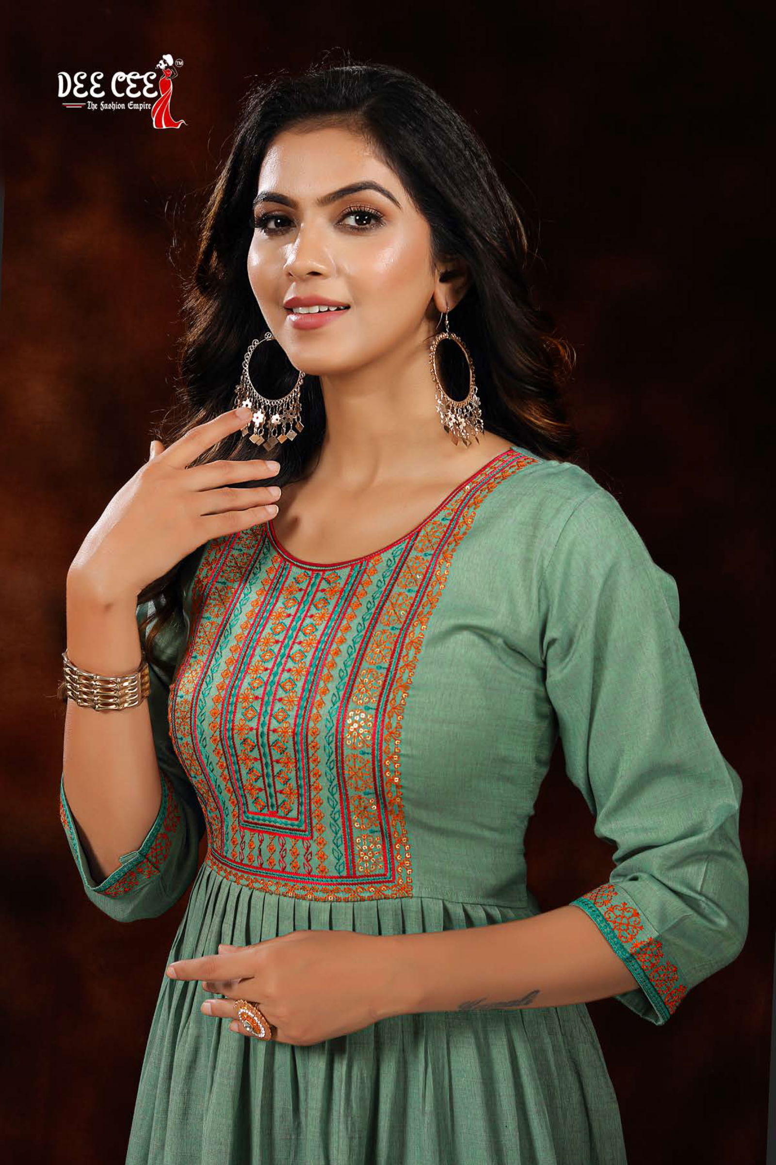 Dee Cee Orange Rayon Fancy Wear Designer Latest Kurtis Collection